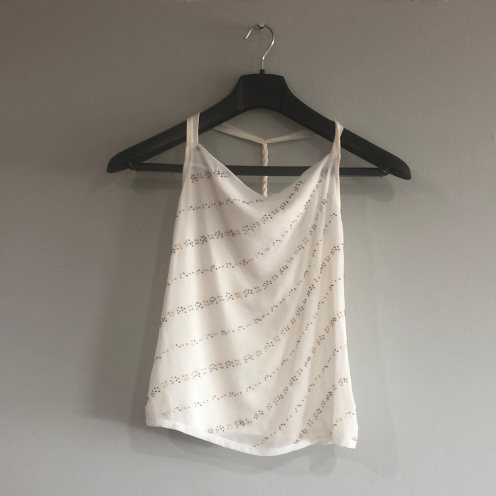White sleeveless top